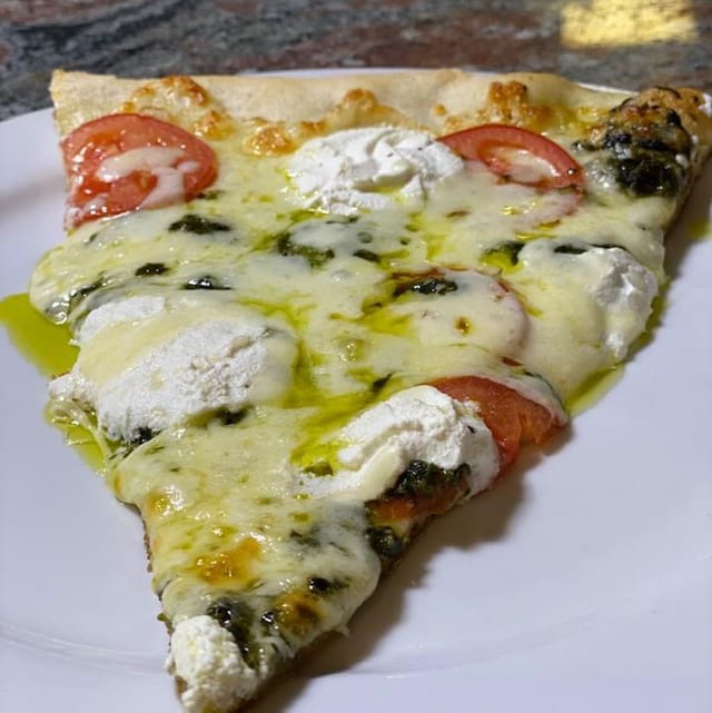 Spinach & Tomato Pizza.